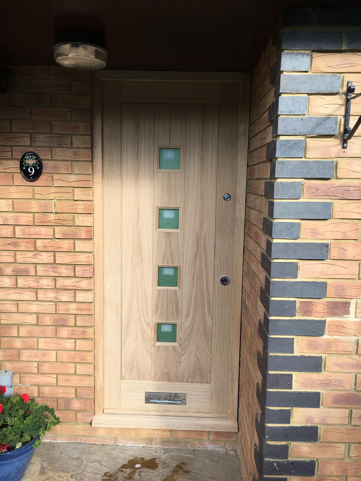 Oak door detail showing grain and varnish finish