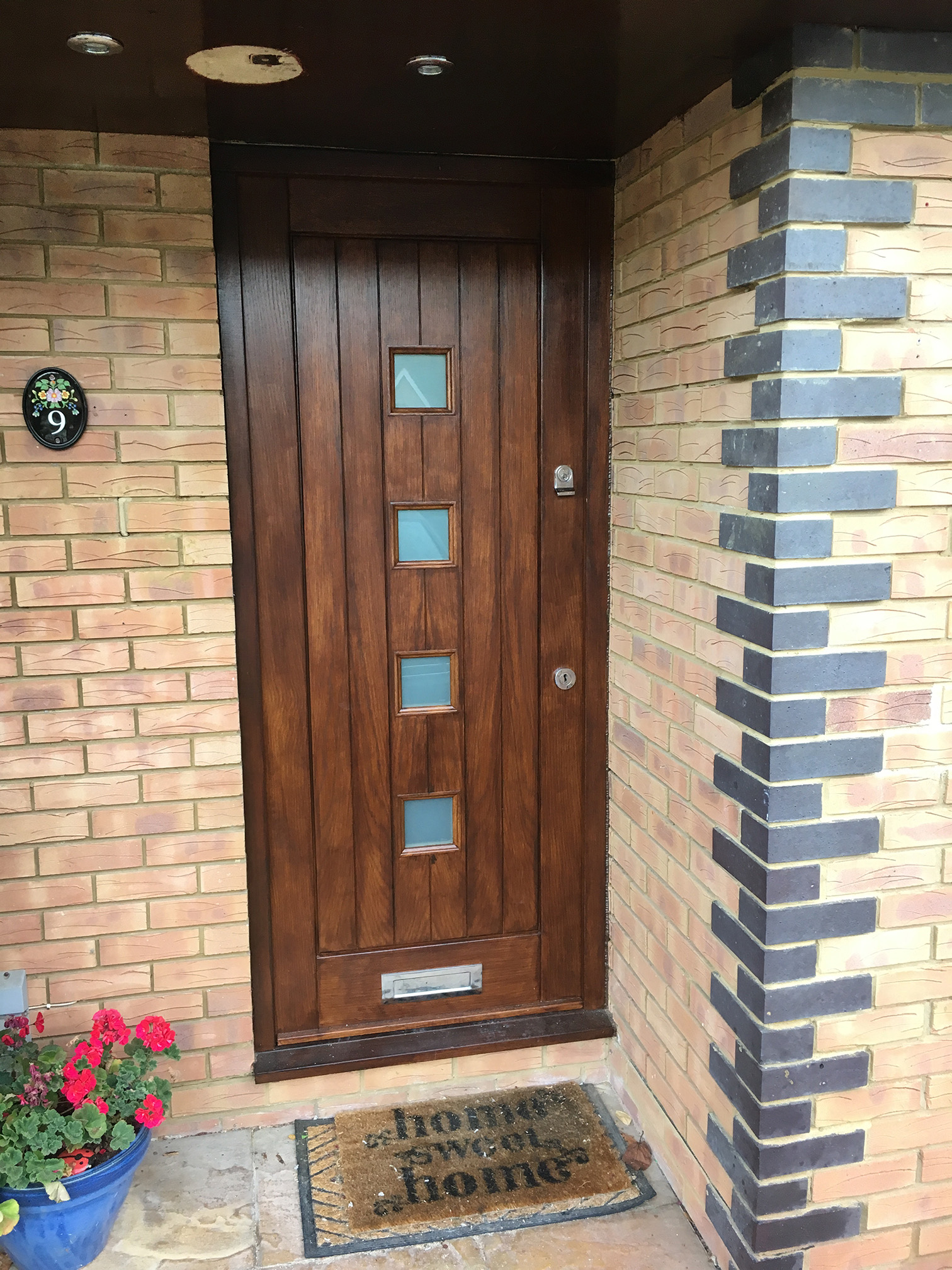 Old front door before replacement